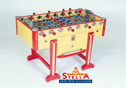 Photo et descriptif: La Passion du Billard baby foot stella Champion Rétro jaune avec monnayeur.