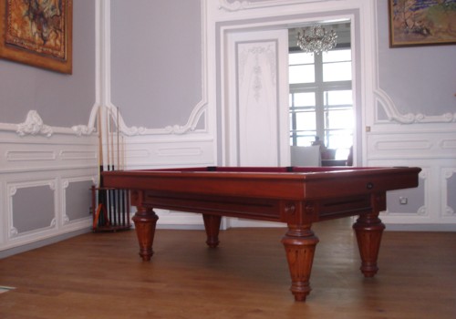 Photo et descriptif: Billard Lafuge Chambord 2m30 en kotibe massif teinte merisier.